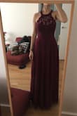 It's a beautiful dress. It looks like on the website picture. I was pleased. The only issue is that it runs large, specially at the bust level. I ordered a size S which is the size I usually wear and it was large on me. Couldnt wear it without adjusting the length and the upper part of the dress at the tailor. The picture are after adjustments were made, and was really pleased with the final result. Would recommend if you are sure of your size. - Melissa C.