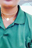I adore this necklace. It does feel a little tight and difficult to get on, but put it on backwards (clasp in the front) and spin it around after- it is much easier. - Solange G.