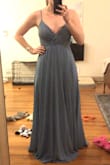 Overall, this dress is very pretty, but the top is fairly low cut and the skirt is REALLY full. Like the dress is almost heavy because it is so full and there is so much fabric. - Olivia G.