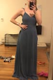This dress is not flattering. The top has no structure and the back is completely open so a bra is not an option. It made me look very flat and saggy. - Olivia G.