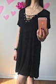 I love this dress so much that I have it in two colors! The material is SO soft, and it hangs on my body well. It's flowy and light and fun. It's a little long for my dress taste - stops right above the knees, and the v-neck is a little deep - but otherwise no complaints. I like to wear it with a bralette. - Liz R.