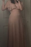 This dress is beautiful and romantic. I am a size small on top and medium on the bottom, so I ordered a medium. It fits almost perfectly except for some gaping at the low cut neckline. Thankfully, it's an easy fix. I love the wrap around tie which allows you to cinch the dress to fit your waist. The flutter sleeves add a bit of whimsy and are cut down the middle instead of covering the whole arm. The only downside for me is the blush color. It's not flattering on lighter skin tones, so pale girls beware! - Colleen W.