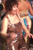 It was about 4 inches too long but I got it altered and OMG it looked amazing on me. My company had a GOLD party in Punta Cana and everyone complimented me on it and wanted to know where I got it. I just love it. Pic below and I'm the 77 yr old redhead firecracker!!! - Elaine W.