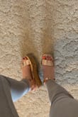 The fit was amazing. The back strap does not bother the ankle at all. It feels like you do not have shoes on they are super comfortable!! Easy to style with anything! - Kunika T.
