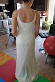 The dress is beautiful. It fits very nicely, which surprised me because it's usually hard for me to find a dress that fits my bust and waist with equal comfort. The material is amazing. The price I paid seems like pennies compared to the quality of the dress. I can't wait to wear it on my wedding day. - Kaitlen P.