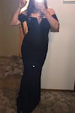 Material is really nice and heavy, but has a little give to it with I found helpful because I have bigger hips and thighs. As a bigger girl this dress was a dream - I thought I might be insecure about my stomach showing but the way the dress is made it all works perfectly! Order this dress! You won't regret it! - Amalia B.