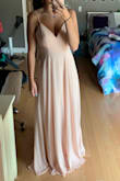 I originally got this for prom, though I found another dress that was more for prom. Though I loved the back of this dress it did seem a little loose in the bottom of the design on the back though was only noticeable to me. HIGHLY RECOMMEND. - Elaina L.