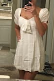 This is soooooo cute. The sleeves on the shoulders might fall if you slouch, and super tight around the arms. But I'll get that fixed. Perfect length for flip flops but def not heels. Pasties are fine with this dress. - Shelly K.