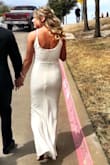Absolutely loved this dress for my wedding! Fit great, simple but elegant. I did get it hemmed since I chose to wear low heels. Many compliments! - Kaela T.
