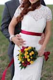 I bought this for my anniversary photo shoot. And I added a lace shirt to the dress for a vintage look and a ribbon waist. I think this turned out top notch. I think it would be a great wedding dress with or without additional items. Dress it great quality and fabric. - Olga B.