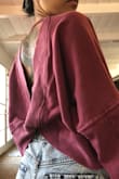 I have this sweater top in black, so I definitely had to get it in pink. The color is actually more burgundy than that nice rust kind of pink in the picture, but I'm still happy with it. Even though the XS fits I feel like I should've went with the S to get more of a looser look. - Jasmine C.