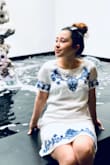 This super cute dress is great to wear for traveling and sightseeing! It is airy, comfortable to move around in, and the blue embroidery is flawless. This dress runs slightly large for my petite frame, but it not oversized. The material also wrinkles easily but it is simple to fix! - Jennifer S.