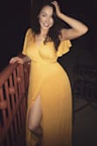 This dress is wonderful - a nice quality fabric without being too sheer or too heavy. I wore it in humid Florida in May for a dinner and I felt gorgeous. The opening in the front does have the tendency to come all the way open, but it does have a lining underneath to protect your modesty. I felt it accentuated my curves and the color was flattering. - Stella O.