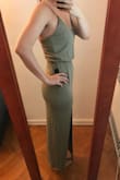 Great dress! The material is really soft, and I love the color. I think this dress can be worn several different ways and can be dressed down or up. It does cling to the body and doesn't hide a lot, but it's so comfortable that I don't mind. I'm usually a 4/6 or a S/M but I'm bigger on the bottom than on the top, and the medium was a little tight - but I don't think I could have gone up a size. - Sarah Q.