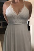 Very pretty. Quite long but easy to hem. Will be wearing this at our family wedding reception at a park in the summer. - Jennifer G.