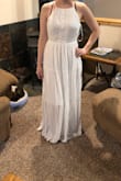 If you're thinking about buying this dress, think no longer. I was hesitant, but I'm so glad I bought it. I'm 5'6 and about 125 lbs, small fits perfectly. It's a bit long but nothing that some wedges won't fix! - Gabrielle H.