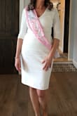 I wore this dress to my bridal shower and got a ton of compliments! The material is stretchy and really comfortable; it's lined as well so nothing was see through. I loved it! - Mara B.