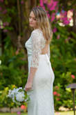 We got married in Jamaica and this was the perfect dress. It was great quality and fit so well while hugging my curves. I did wear spanx underneath just to smooth everything out. Highly recommend! - Krista S.