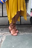 These shoes are pretty high, but very pretty on! They aren't terribly uncomfortable, and once you're used to them, they aren't difficult to walk in. All in all, I love these shoes and will be wearing them often!! - Melinda M.