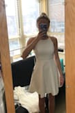 I really liked this dress, it was the perfect length and the material was so soft! The open back was really flattering, and it was nice because you could tie it tighter to adjust the fit. 

I had to send it back though because it was a bit loose in the chest area -- I'm a 32A though so if you have literally any more bust than me it will probably fit you better. If I wore a bra with it it would've looked better, but with the open back its more of a braless dress (and I didn't feel like dealing with a stick on bra). - Emily R.