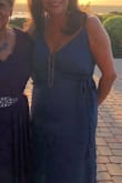 I purchased this dress for a special wedding. I didn't want a long dress, but I wanted something beautiful. The color was gorgeous.. my husband loved the dress. I received a ton of compliments. The dress fit great and has great movement. It has a very luxurious feel to the material, not too shiny, but just enough sheen to the material. love this dress, will wear it again, first chance I get. - Catherine M.