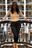 This was my first bodysuit and I loved it! I wore it for my bachelorette party and it was the perfect daytime outfit. The fabric is thick enough to not be see through, but it is easily light enough for a warmer day. The shoulders stay put and don't ride up all day and the thong back is perfect if wearing a thinner bottom piece. Super flattering!!!! - Erin M.