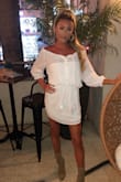 This dress fit perfectly! I was worried about it being see through, so I wore a white bandeau underneath which was perfect. I got so many compliments on it! You can dress it up or down. So cute! - Deanna C.