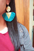 These teal tassel earrings are the bomb! What you see is what you get, big and beautiful earrings with a golden touch. Beautiful for any occasion. A bold statement. - Sandra G.