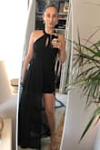 This dress is so easy to wear. The top holds everything in, the length of the skirt is short but the flowy layer covers everything so I felt very comfortable. Sexy back, perfect length with black heels. - Ravena D.