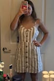 Super cute summer dress!! I can't wait to wear it when I'm tan :) It fit perfectly - I'm 5'3 and 120 lb and got a small. Sorry it's wrinkly in my picture - I got so excited and tried it on right away!! - Meredith D.