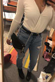 Love this shirt, but when I feel modest I use a safety pin to pin up the middle, and it's not noticeable (I have it safety pinned in the photo). - Maribel G.