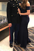 I wore this to a military ball, fit was on point and the length was perfect for me to wear with a small heal. Unlike other reviews, I didn't find the arms restrictive at all. - Michella C.