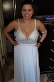 I had oringinally bought another dress for my beach wedding. It was okay. However, once I saw this dress I ordered immediately! It fits perfectly. I have to get shortened a bit. But I can't wait to show it off!!! - Faith D.