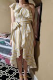 The material was different than I was expecting -- extremely wrinkly, the kind of material that rewrinkles after you iron it with every move. I also didn't love the bottom as much as in the picture. But even with all of that, I am keeping the dress. I think it will be a good summer day dress, which I am desperately in need of. - Paige B.