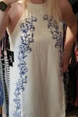 This runs really loose so order down unless you want it very flowy/loose. After I altered it it's really cute. - Julie B.