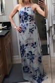 I fell in love with this dress in the picture. But - it's my first ever order from Lulus and they didn't have it in XS. I took a chance on the S and got it. But there's just no way! I'm so small I can't even select my hip size which is actually 32"! It starts at 34"! The top is adjustable so I was able to make that fit ok, but the waist was just too big and it was VERY long. Even in 3" heels I would need to cut a good 2-3" off the bottom. So sadly it's going to have to go back. The fabric is beautiful. Background is actually grey - looks white in my pic. It's very well made, classy and elegant. The back is just gorgeous! It's definitely True to Size - I just picked the wrong size for me! - Nicola W.
