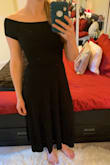 This dress is very cute but not well fitted. There is a thick elastic band at the waist and the shoulders. It didn't look terrible but wasn't comfortable. I'm considering sizing up, but I'll definitely return the one I got in M - which Is what I usually wear. - Lara S.