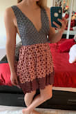 This was just... a little awkward. First, the waistline was too high for me, which seems to be the case in some of the other photos as well. Second, wtf is going on in the back?! It laces but, but NOT at the waist, then there's a bunch of gathered material poofing out of the Middle of you back. 
I loved the print, and it's a nice thick material, but the fit just didn't work for me. - Lara S.