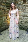 I adore this dress! It's so beautiful and fun! I should have ordered a small, but I was afraid the waist would be too small. The chest was too big because of my size up, so thank goodness for the adjustable straps and a safety pin! - Erin M.