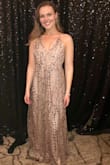 I felt like all eyes were on me in this dress! Warning- the glitter and sequins do come off wherever you sit but I really wasn't that bothered by it. I usually wear a large but since there weren't shoulders to this dress, the medium fit my waist better. The straps are adjustable which was helpful for my smaller bust. Loved. This. Dress! - Lindsay E.