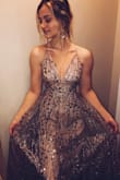 This dress is beautiful and is SO true to the picture. I love the sparkles and glitter! The only thing is that the glitter does get everywhere but other than that it's a gorgeous dress and I can't wait to wear it for prom! - Savanna S.