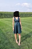 I have a very small bust (under bust is about 29in), so an XS fit me perfectly (wore a sticky/adhesive bra)! The dress is flowy and the material is thick yet still stretchy. The color is prettier in person (color in pic didn't turn out so great). This was the perfect "above the knee" dress! - Jeeyoung W.