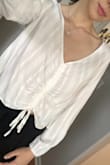 I absolutely love this top. It's so beautiful and lightweight for spring and summer. I can't wait to style it more ways! - Peyton M.