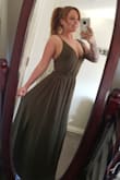 I found the dress to fit like a glove! 
I was between a medium and small... I am happy that I had selected the small, I found it fit perfect everywhere! - Reanna B.
