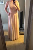 I ordered this dress in a medium and love it! I got it altered so that an inch or two was taken off of the length and now it is perfect - although it would not have needed to be altered if I was wearing higher heels! - Holly K.