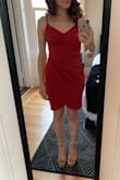 I go between an xs and s - for more structured dresses I'm usually an xs, but since this is more of a stretchy bodycon I was more comfortable with the s. It's still quite fitted and comfortable and the front is very flattering. I think I'd be comfortable going braless in it as well. - Laura B.