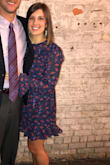 Wore this for a wedding. It fit perfectly. If I was any taller though it would have probably been too short (with bending over) I got a lot of compliments. There is NO stretch to the material FYI. There is a slip attached in the inside as well. Ties at the waist. - Sadie H.