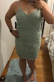 I am a size 10/12 dresses, size 8 jeans, and 36D bra size. The large was too small to even get above my hips. The XL fit much better. I returned since it wasn't as "fancy looking" on (bought this for a formal wedding). Nice material and well made though! - Meagan L.