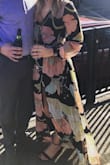 Loved this dress for an early spring wedding. Very comfortable material, not very heavy. Runs a big dress wise, a little tight in the shoulders. - Caitlin R.