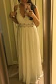 This dress is so much cuter than I could have imagined. I'm going to wear it to my wedding rehearsal. You will need a white bra if you are thinking of buying the white one. It's quality fabric, but a little too see through for me to go without a bra. I love it! - Molly K.